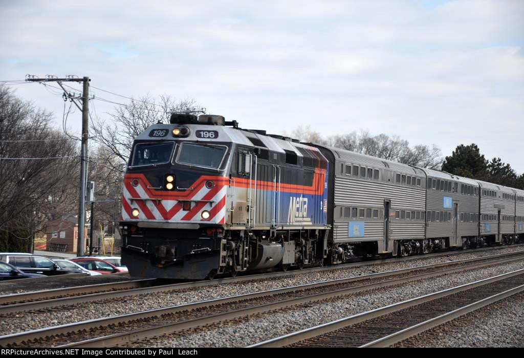 Outbound commuter approaches the station